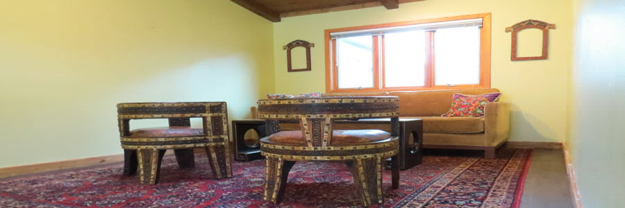 Yoga mat with a blanket and band on top